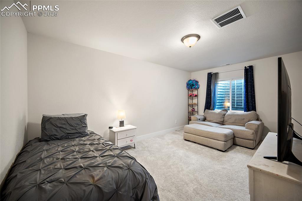 Image 31 of 39: Bedroom