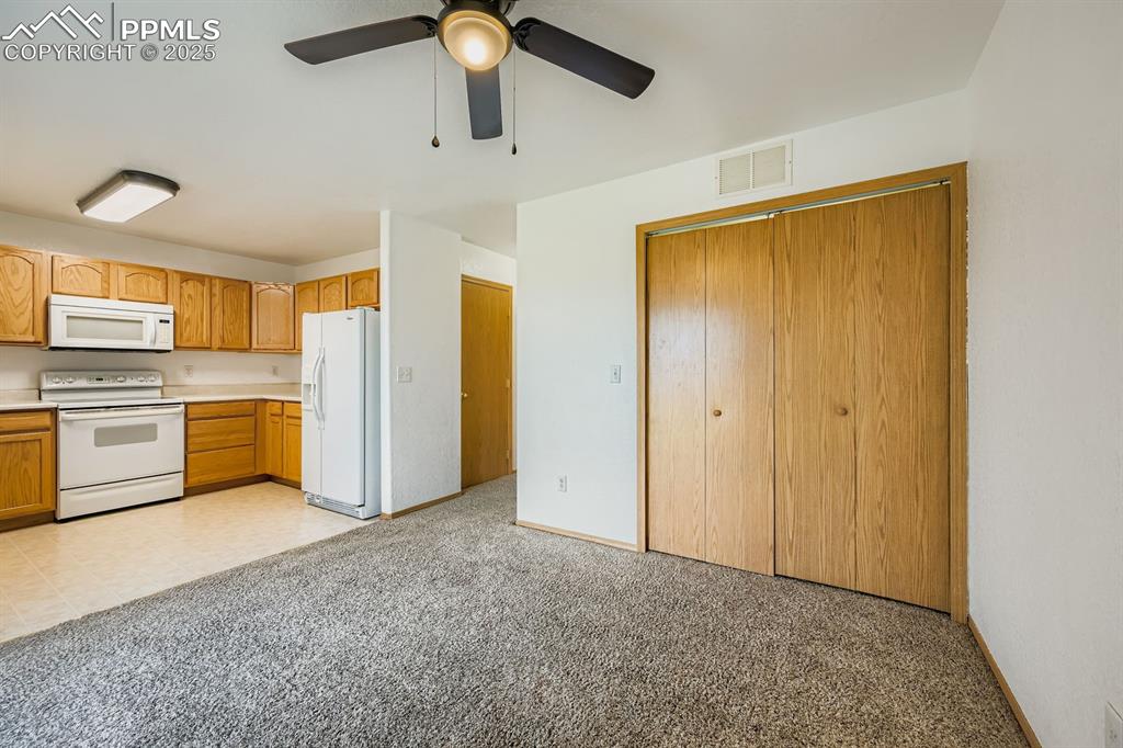 Image 15 of 44: generous dining with walk out to backyard