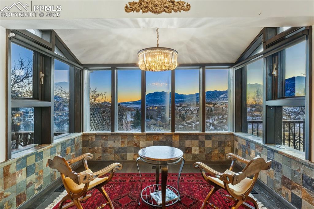 Image 16 of 46: Relax in this comfy scenic sitting room! 