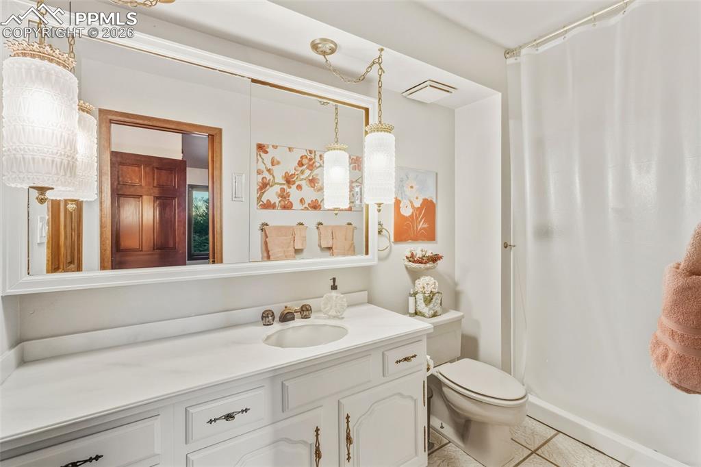 Image 25 of 46: Guest bathroom on main level. 