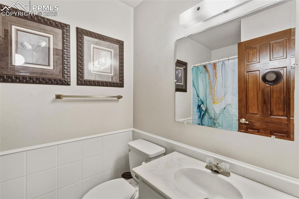 Image 29 of 46: 1/2 bath attached to bedroom on main. 