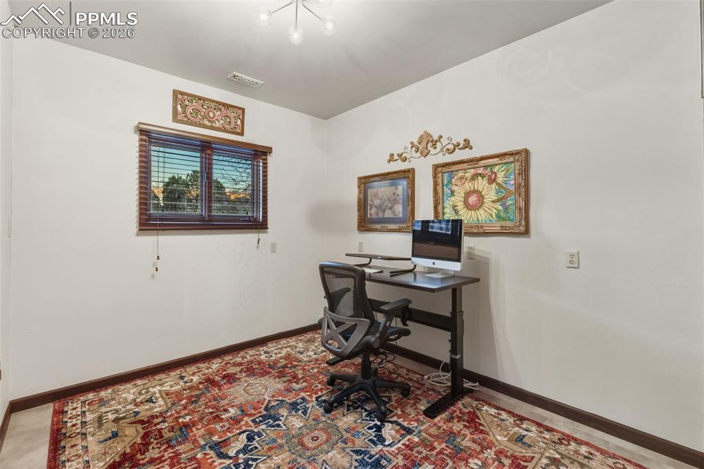 Image 30 of 46: Bonus room in basement. 