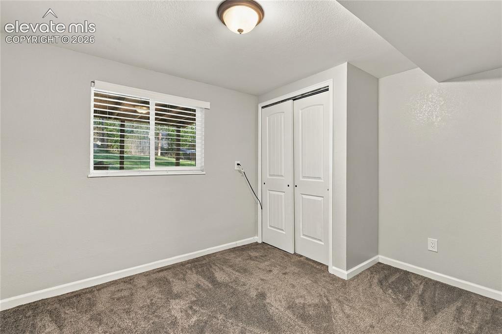 Image 18 of 26: Bedroom