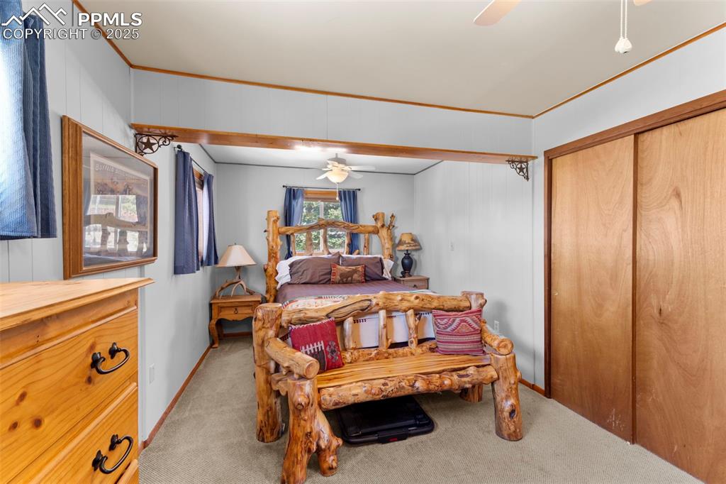 Image 10 of 31: Large bedroom with enough room for bunk beds to maximize family gatherings 