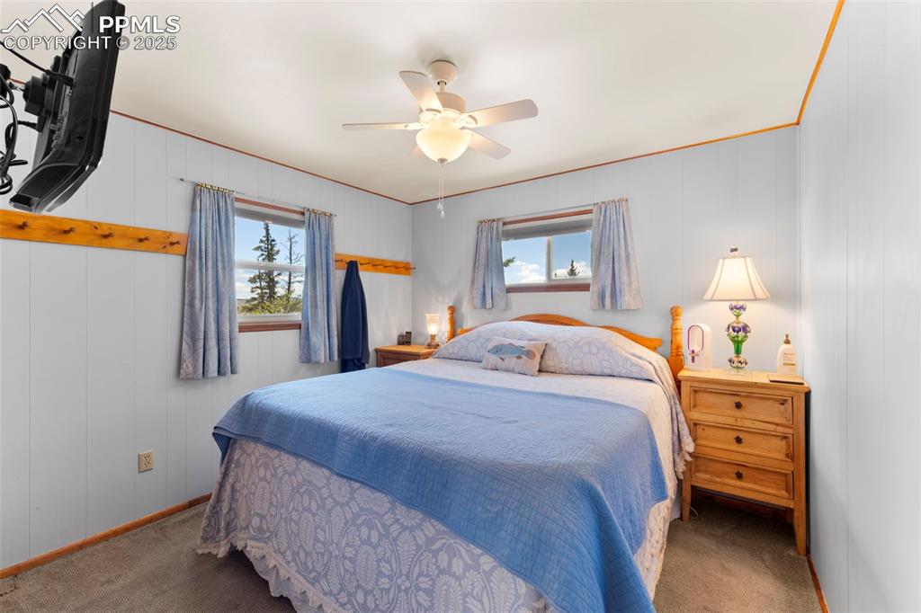 Image 12 of 31: Bedroom with lots of natural light.