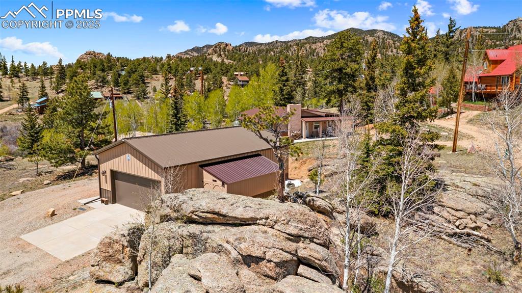 Image 29 of 31: View of subject property featuring mountains and rock formations.