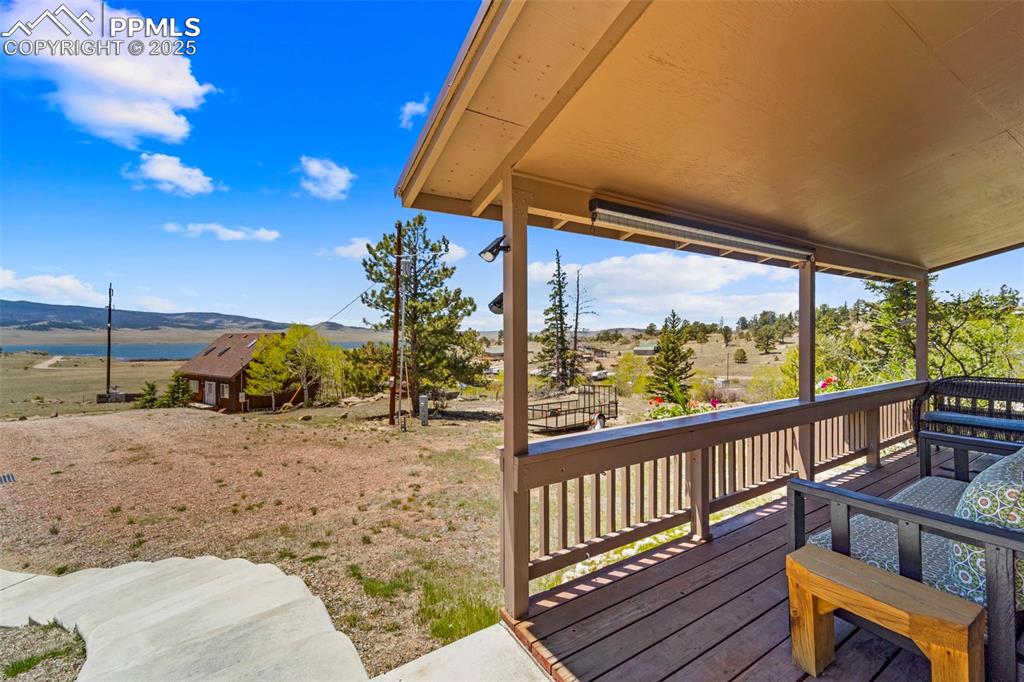 Image 4 of 31: Front of home porch with water views.