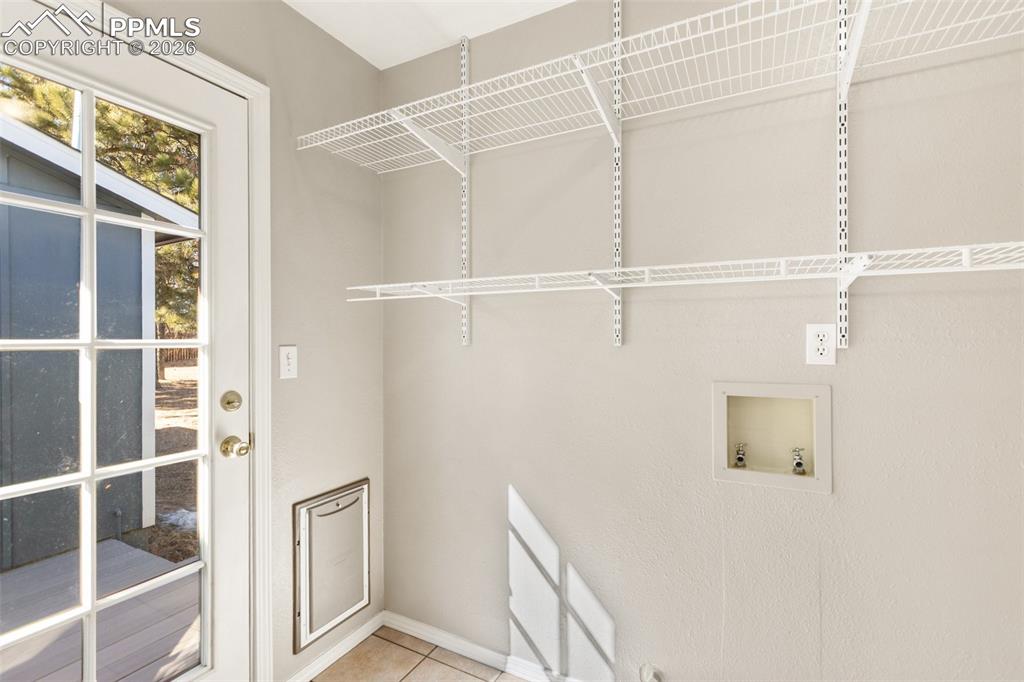 Image 15 of 34: Bright Laundry Room