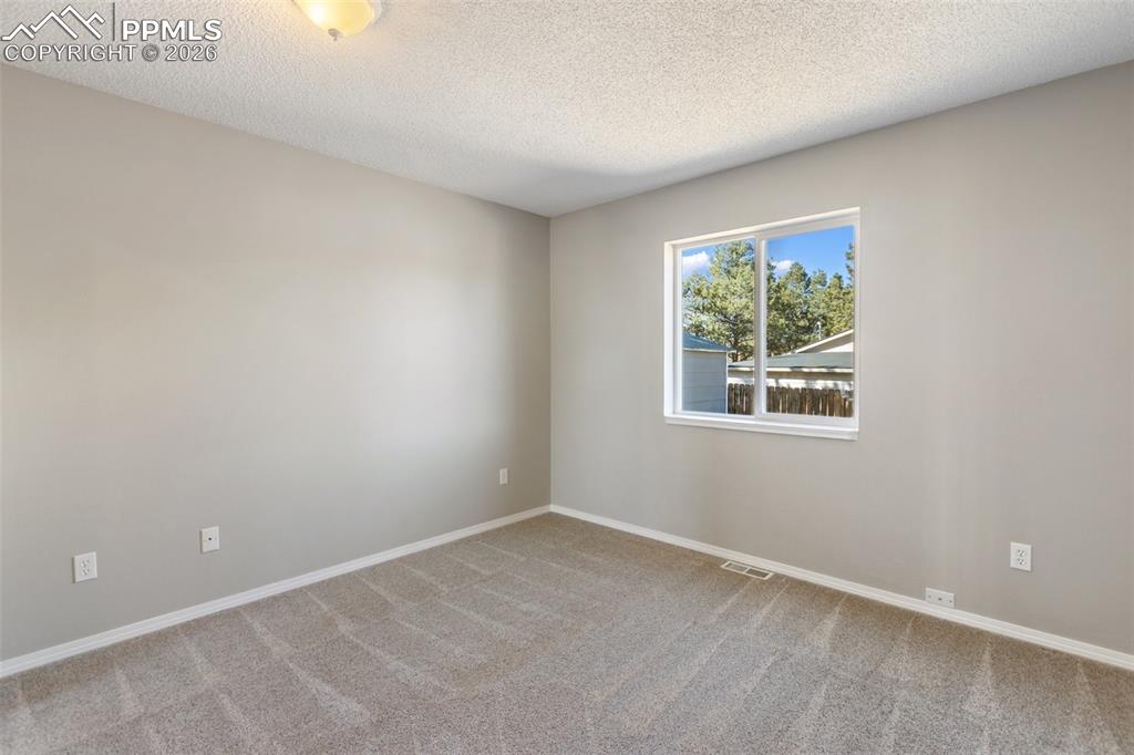 Image 20 of 34: Master Bedroom