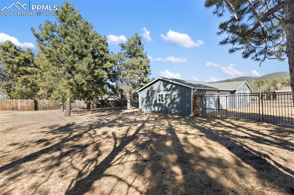 Image 29 of 34: Amazing Backyard with lots of room to store your RV, Trailers or Work Vehic