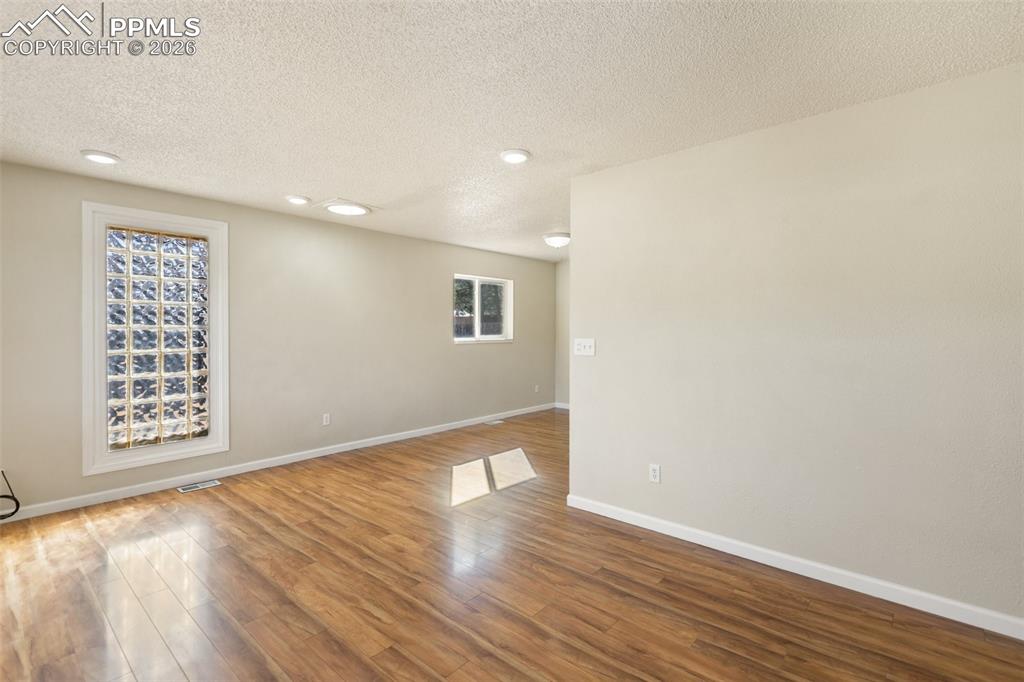 Image 6 of 34: There is even a Natural Light Tube to keep the room open and bright