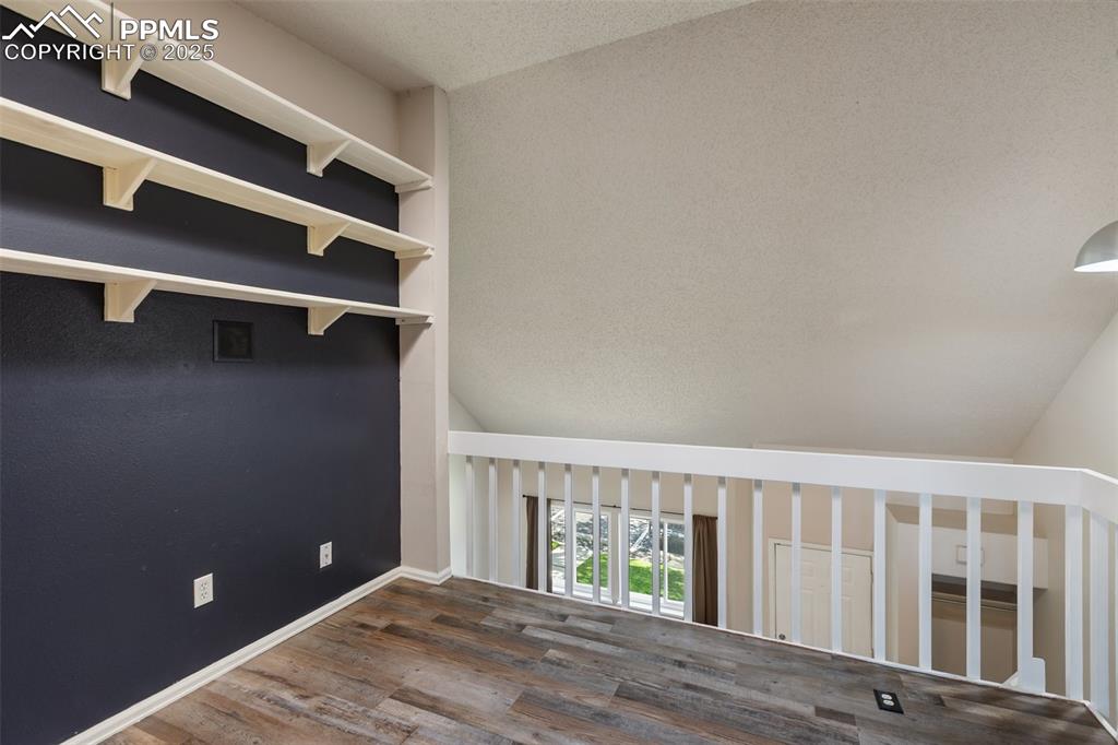 Image 10 of 29: Upstairs balcony