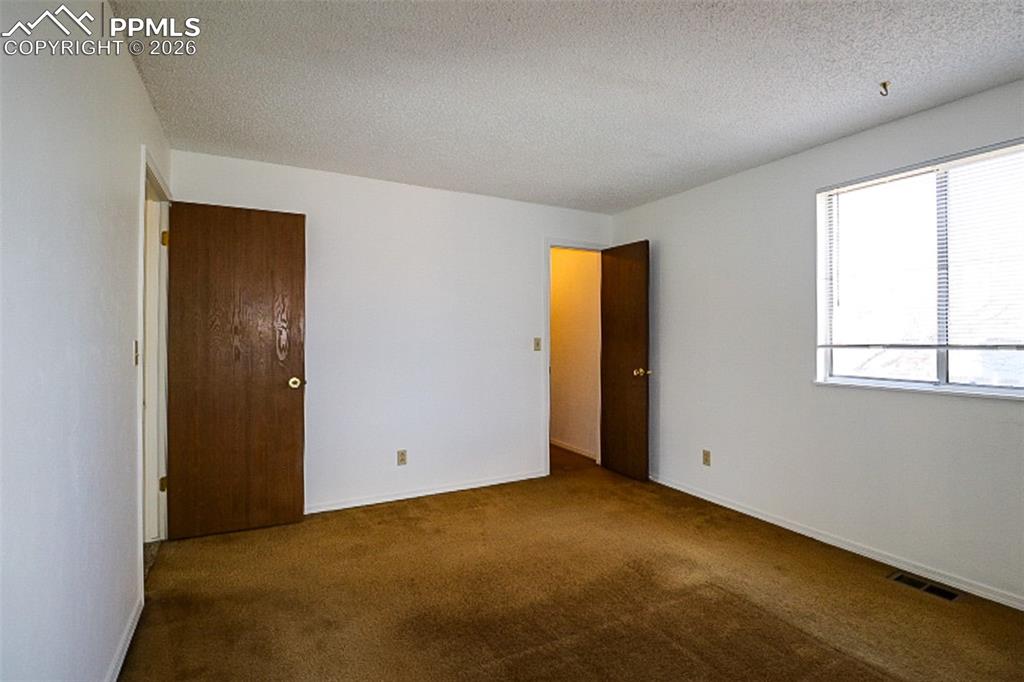 Image 12 of 27: Bedroom