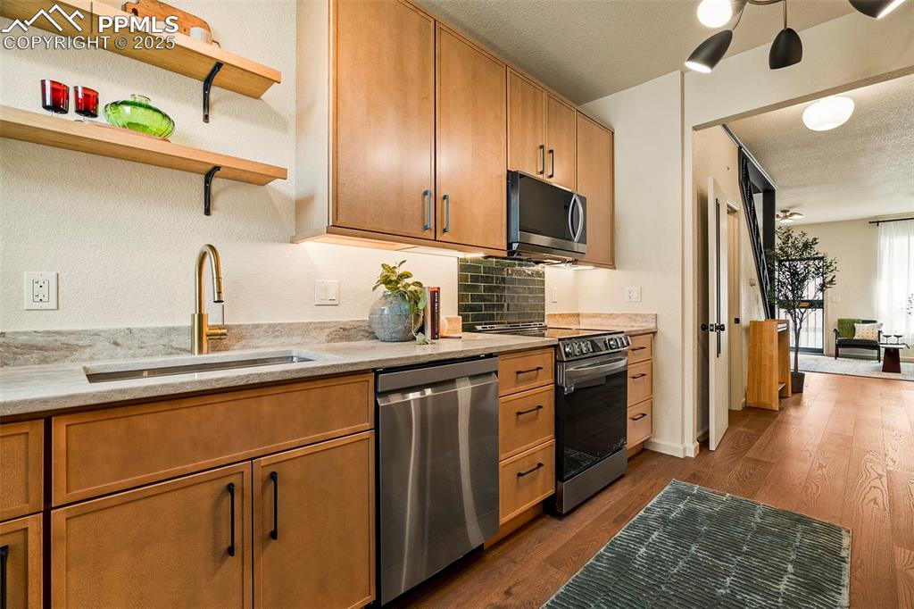 Image 19 of 47: The large custom kitchen has been completely remodeled, with tons of upper/