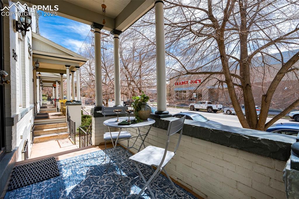 Image 3 of 47: The patio is lovely shaded within the mature canopy of trees. Main level, p