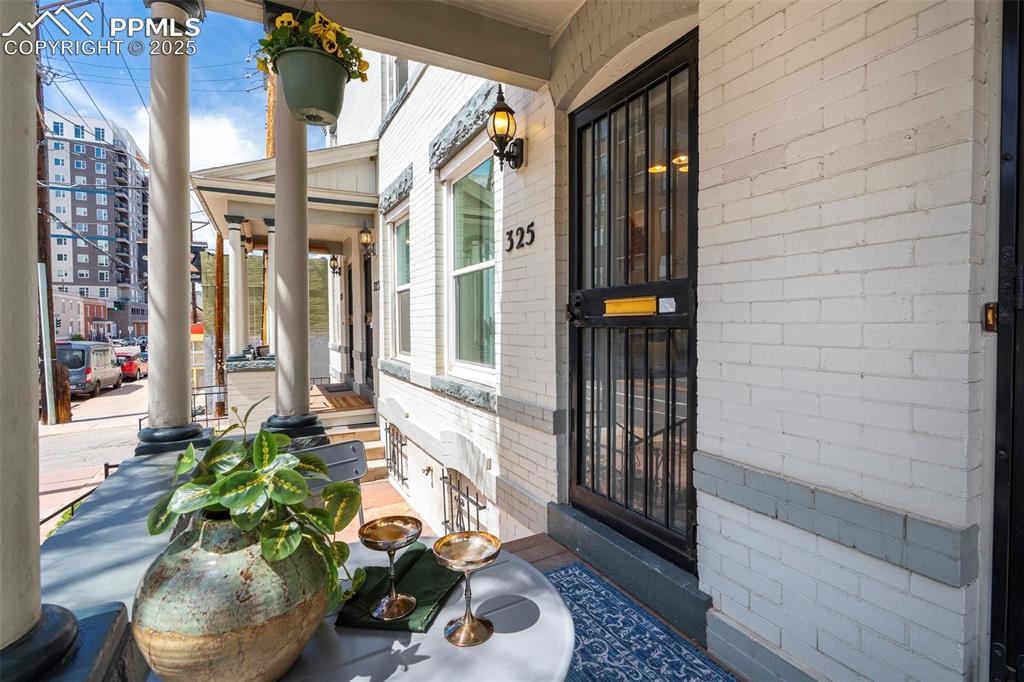 Image 4 of 47: The patio is lovely shaded within the mature canopy of trees. Main level, p