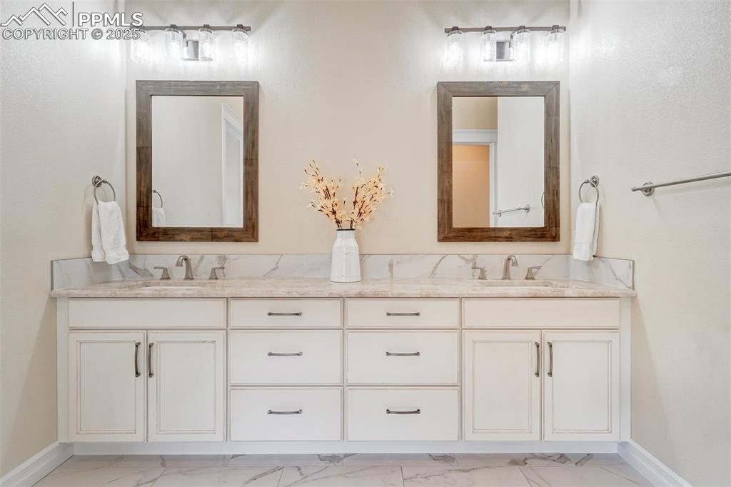 Image 14 of 50: Clean, spa inspired design.