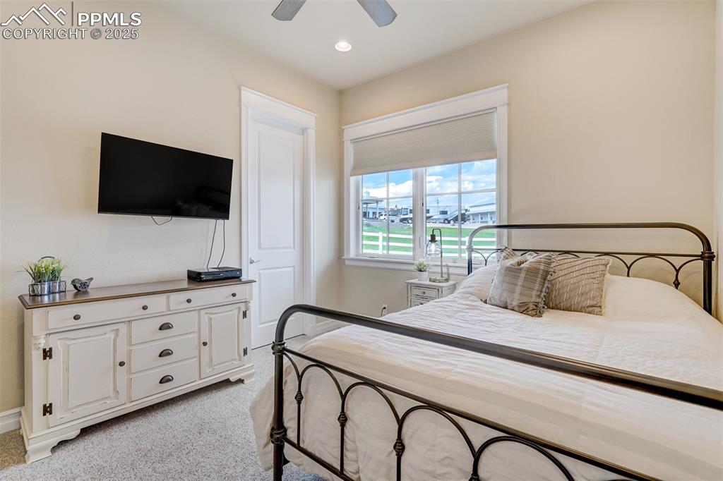 Image 18 of 50: Second bedroom on the main level which is a Jr. Suite