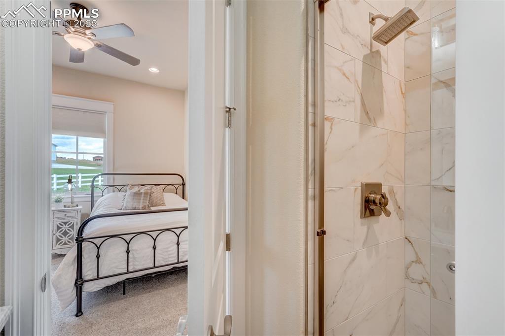 Image 19 of 50: Attached bathroom