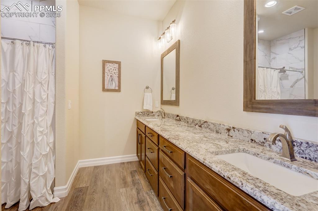 Image 38 of 50: Full basement bathroom.