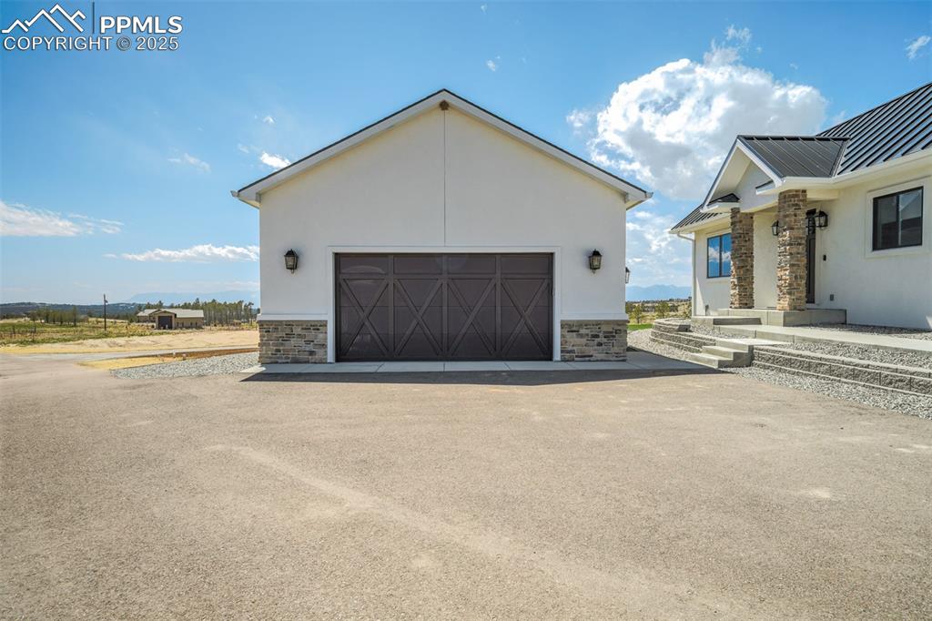 Image 49 of 50: Detached garage/ shop.