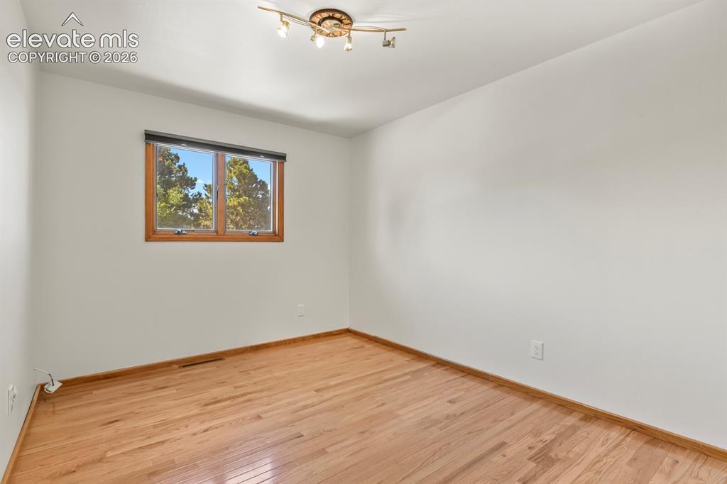 Image 19 of 50: 3rd upper level bedroom