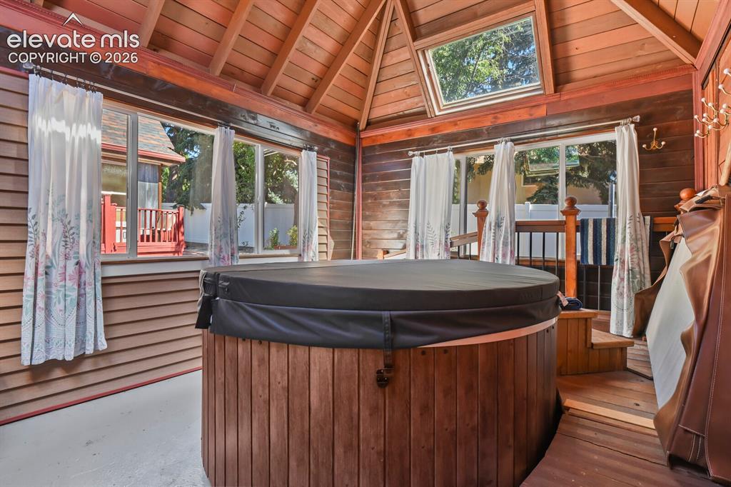 Image 32 of 50: Brand new hot tub in enclosed 1st building