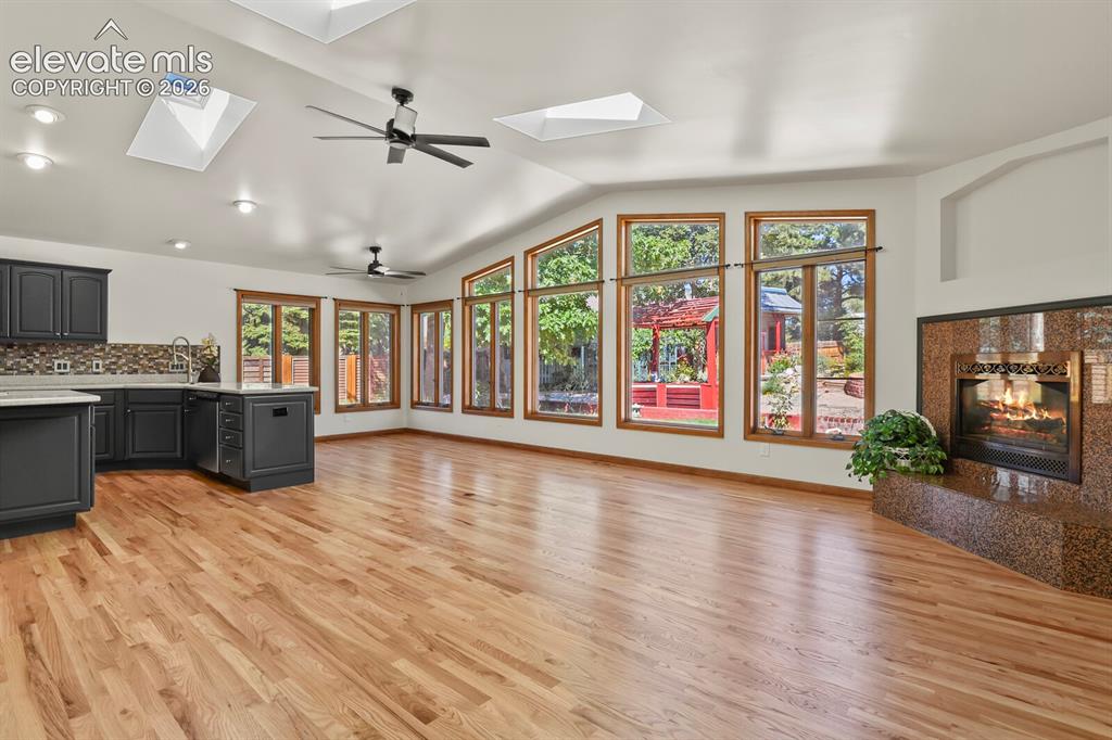 Image 4 of 50: Wall of Anderson windows in Great room