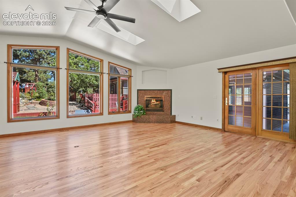 Image 5 of 50: Great room with gas log fireplace 