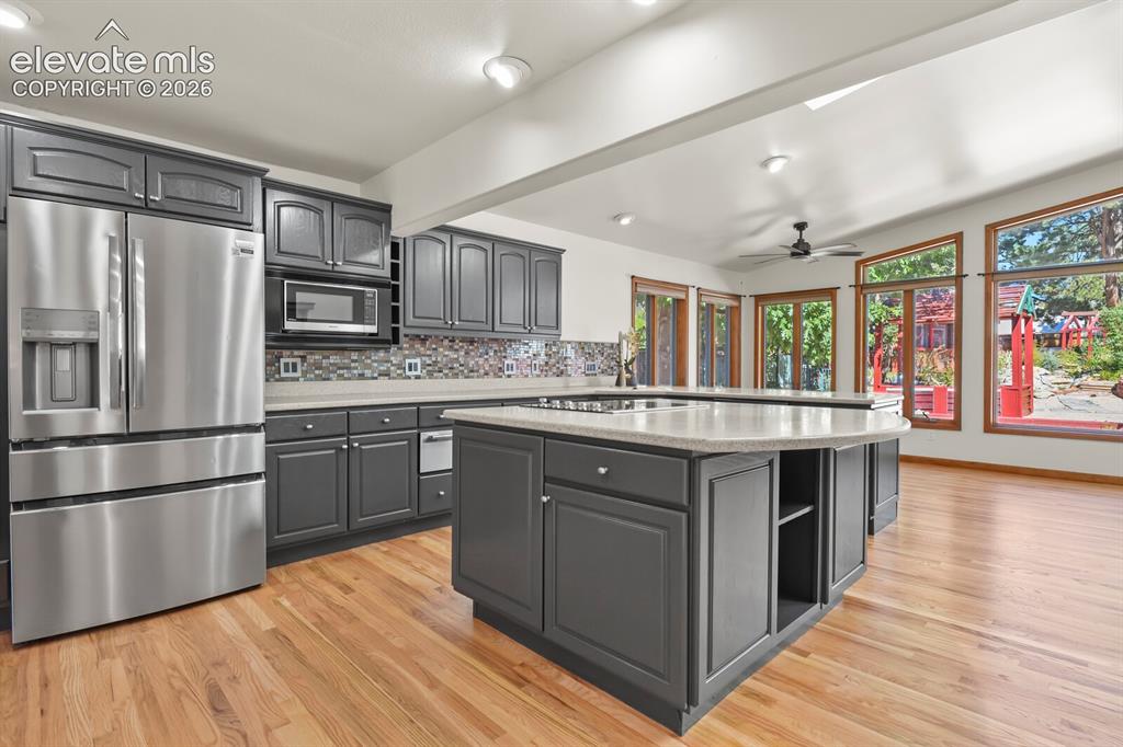 Image 6 of 50: Dining area to the right of kitchen