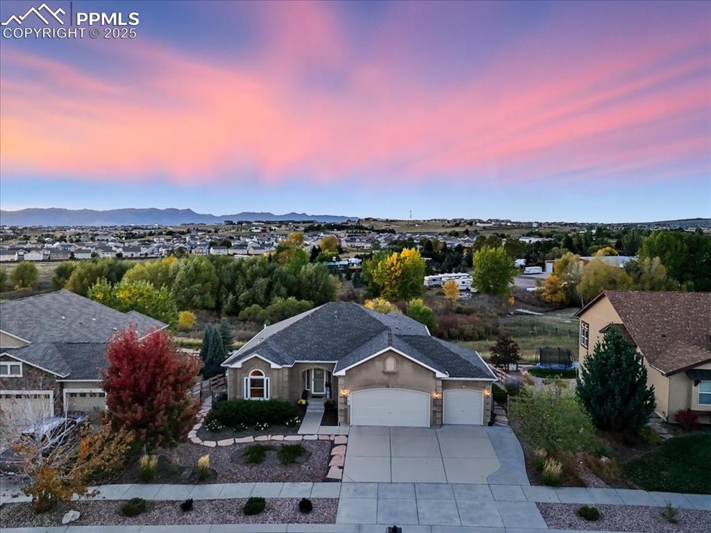 Image 25 of 26: Aerial view at dusk