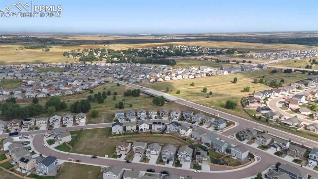 Image 40 of 45: View of property location with nearby suburban area