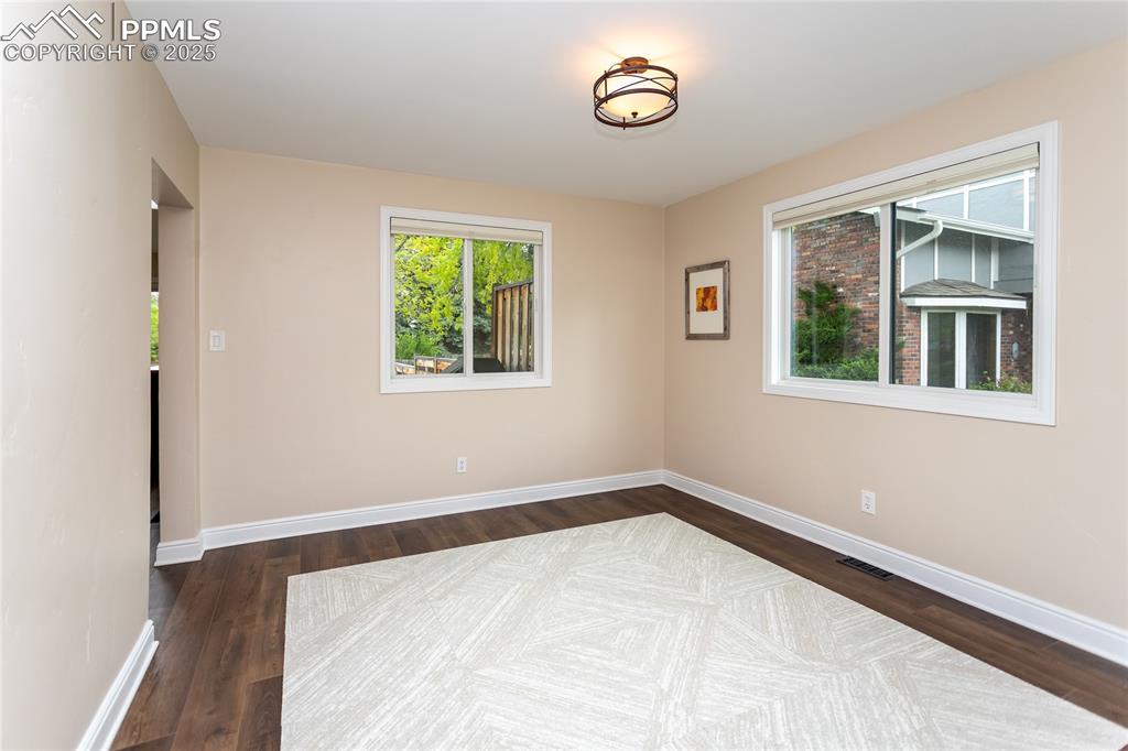 Image 12 of 50: formal dining room.