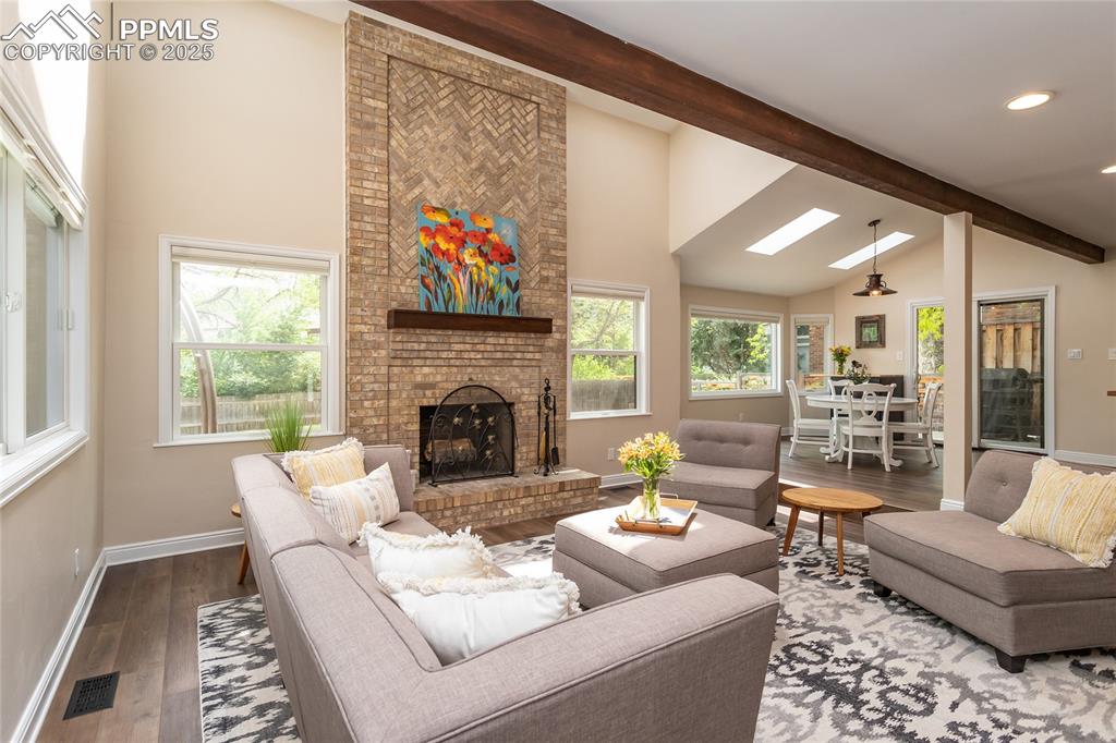 Image 15 of 50: Family room opens up to the kitchen and the dining nook