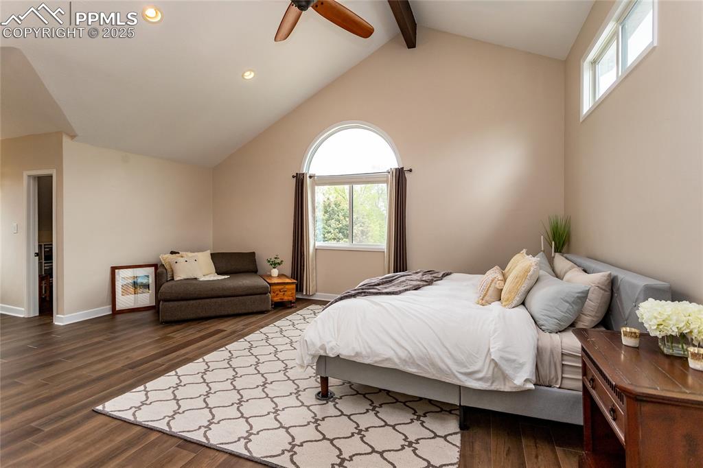 Image 23 of 50: Welcome into the beautiful primary suite with vaulted ceilings!