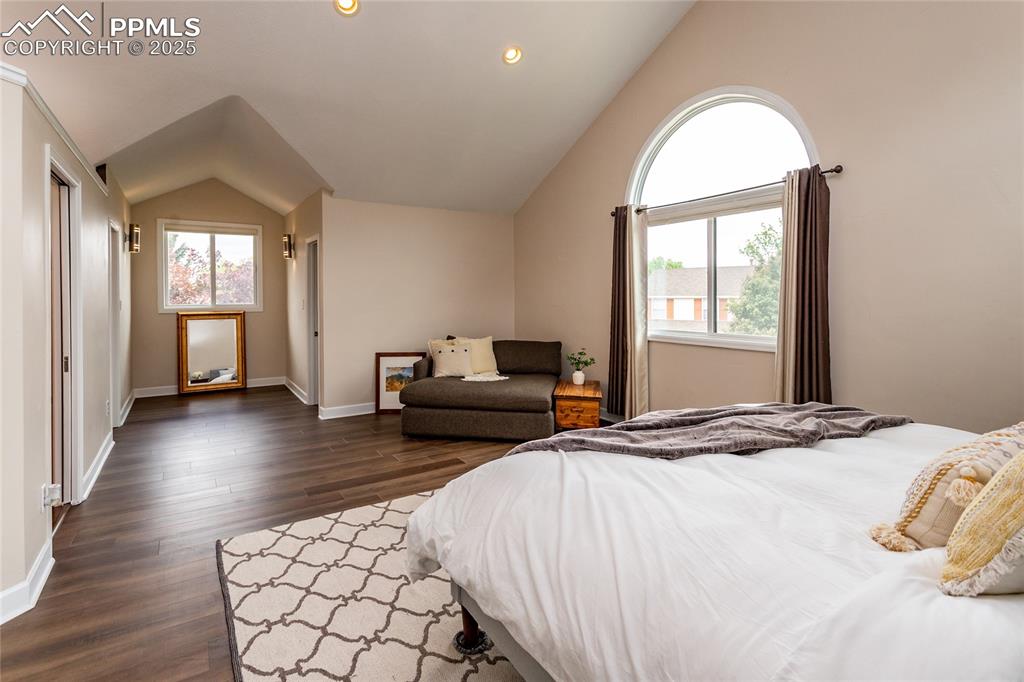 Image 25 of 50: Primary suite features a sitting area and 2 generously sized walk-in closet