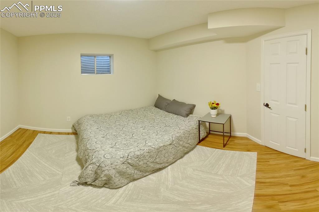 Image 46 of 50: Basement bedroom has a walk-in closet