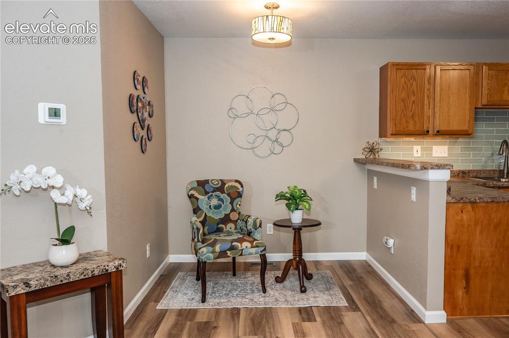 Image 15 of 34: Breakfast nook with bar or bonus multi-use area