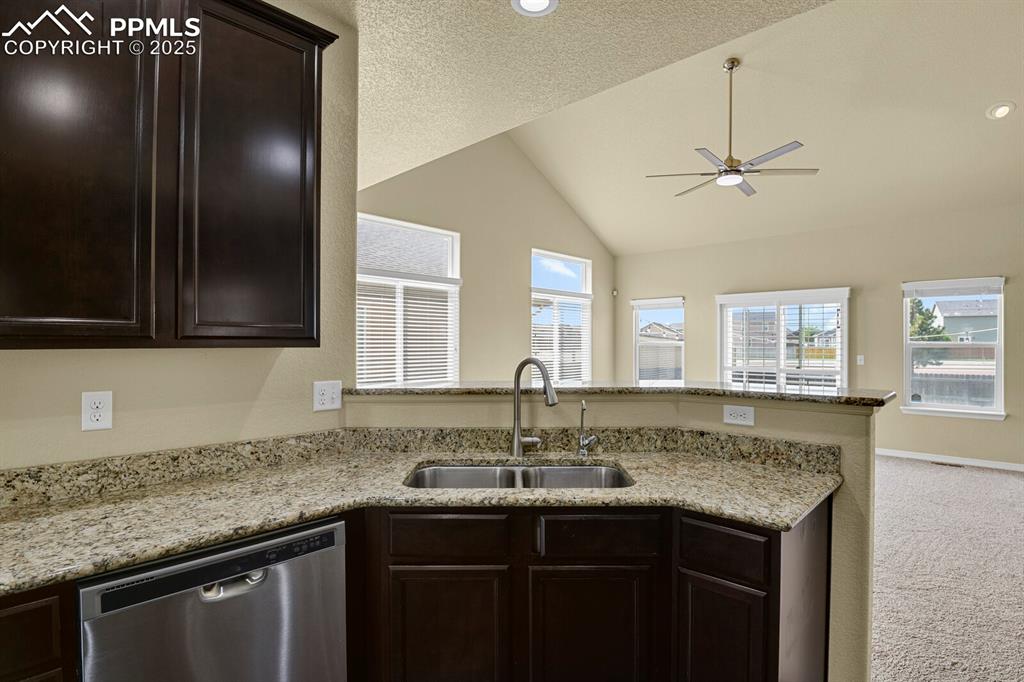 Image 14 of 33: Breakfast bar and water filter. 