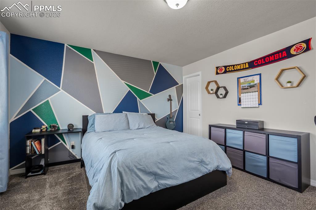 Image 24 of 50: Bedroom