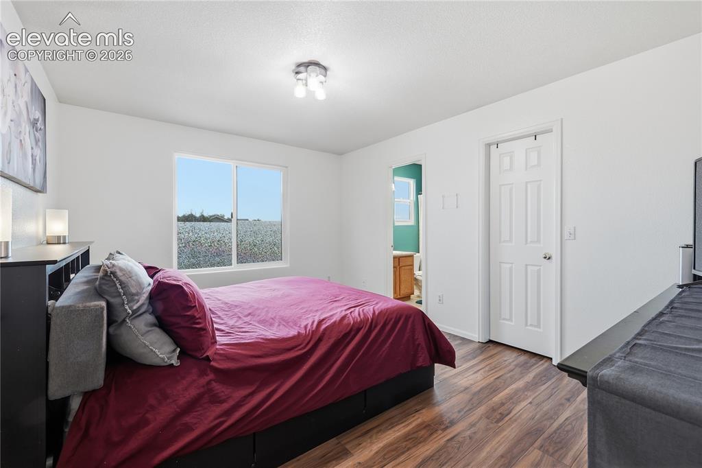 Image 18 of 38: Bedroom