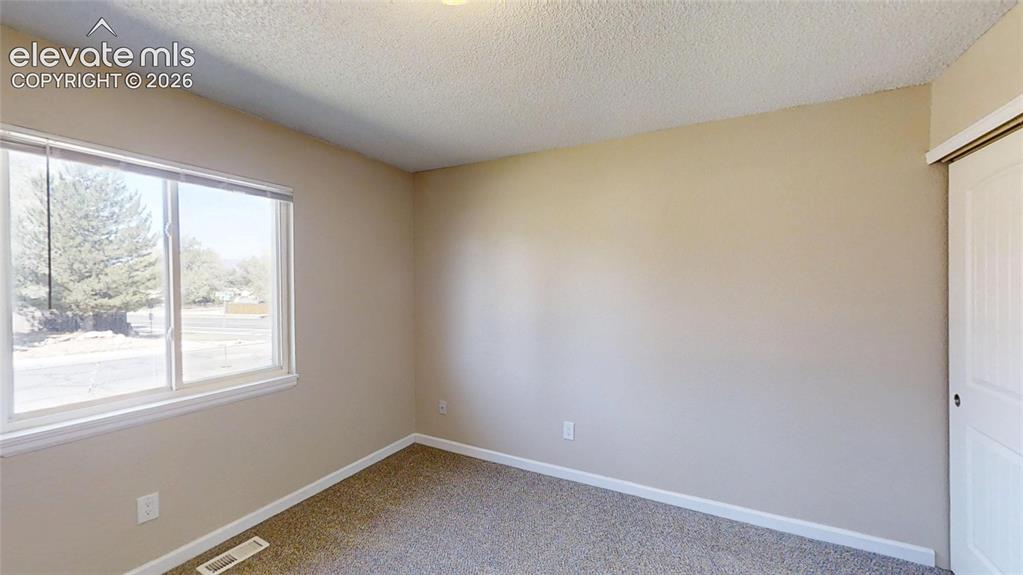 Image 10 of 15: Bedroom