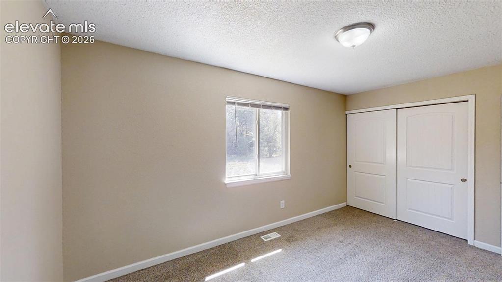 Image 9 of 15: Bedroom