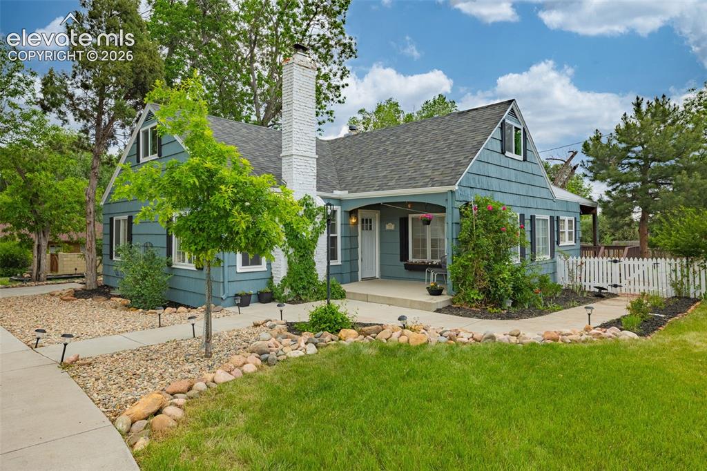 Image 1 of 50: Blue exterior siding with white trim