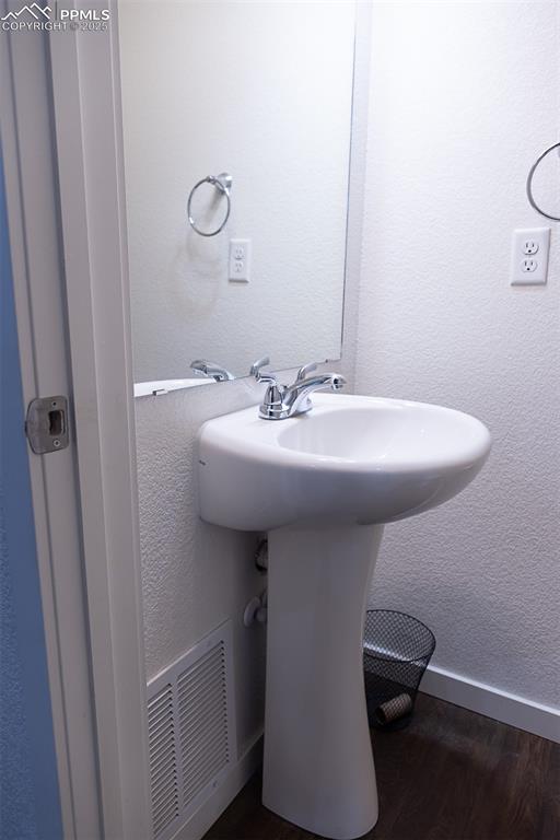 Image 16 of 37: main level powder bath