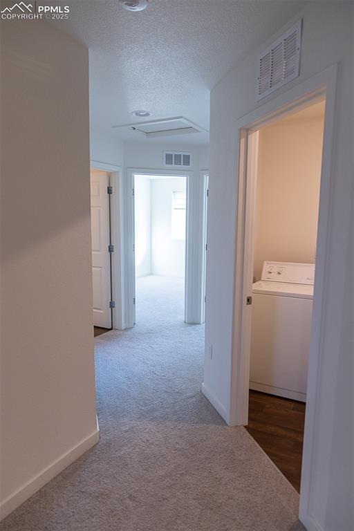 Image 23 of 37: upstairs hallway view from primary bed