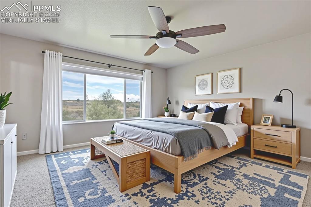 Image 23 of 50: Virtually Staged - Master Bedroom with carpet and ceiling fan