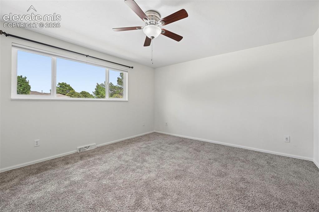 Image 12 of 27: Unstaged bedroom