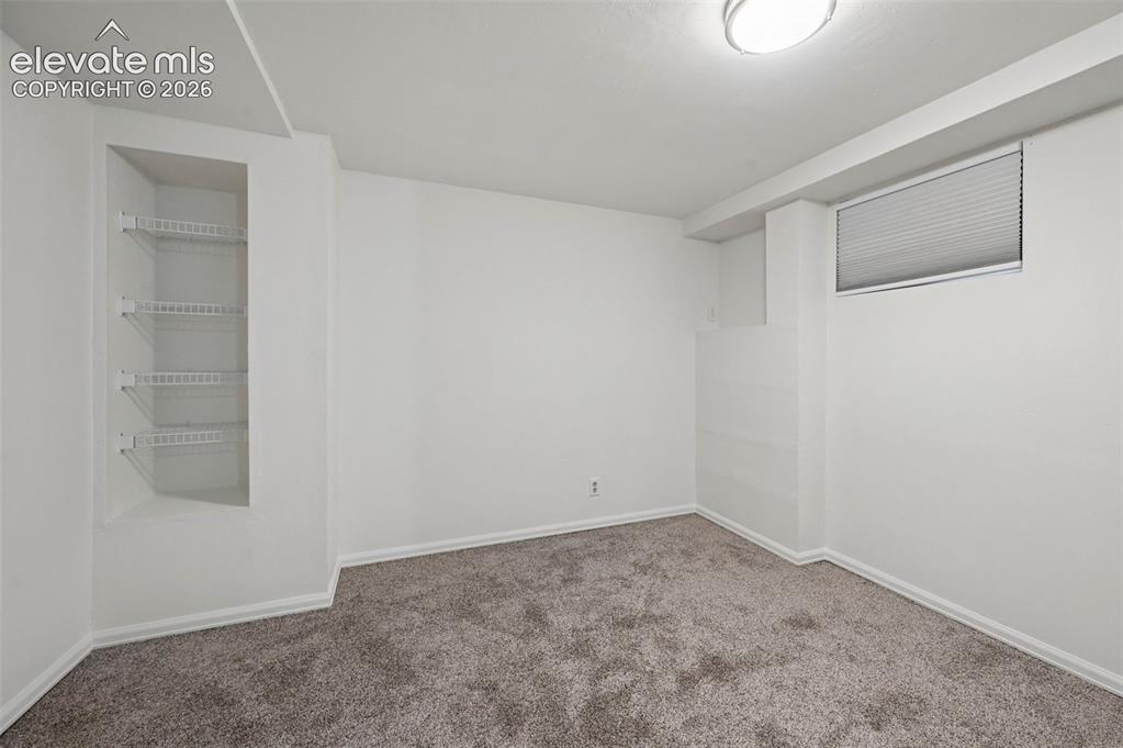 Image 15 of 27: Unstaged bedroom