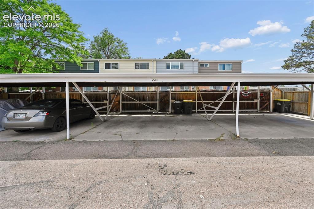 Image 26 of 27: Designated carport spaces accommodates up to 2 vehicles!
